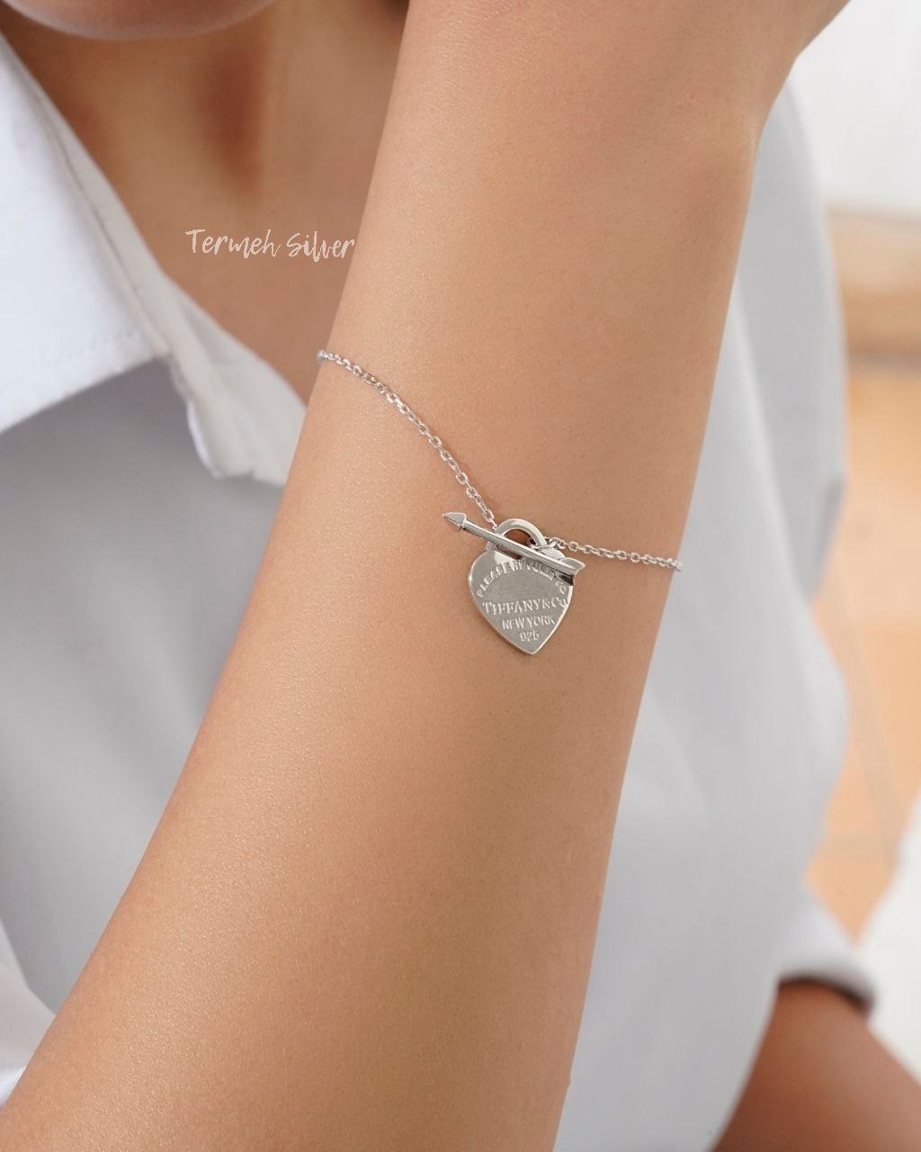 photo_2025-09-06_02-58-28 دستبند نقره قلب تیفانی DT 1161 1